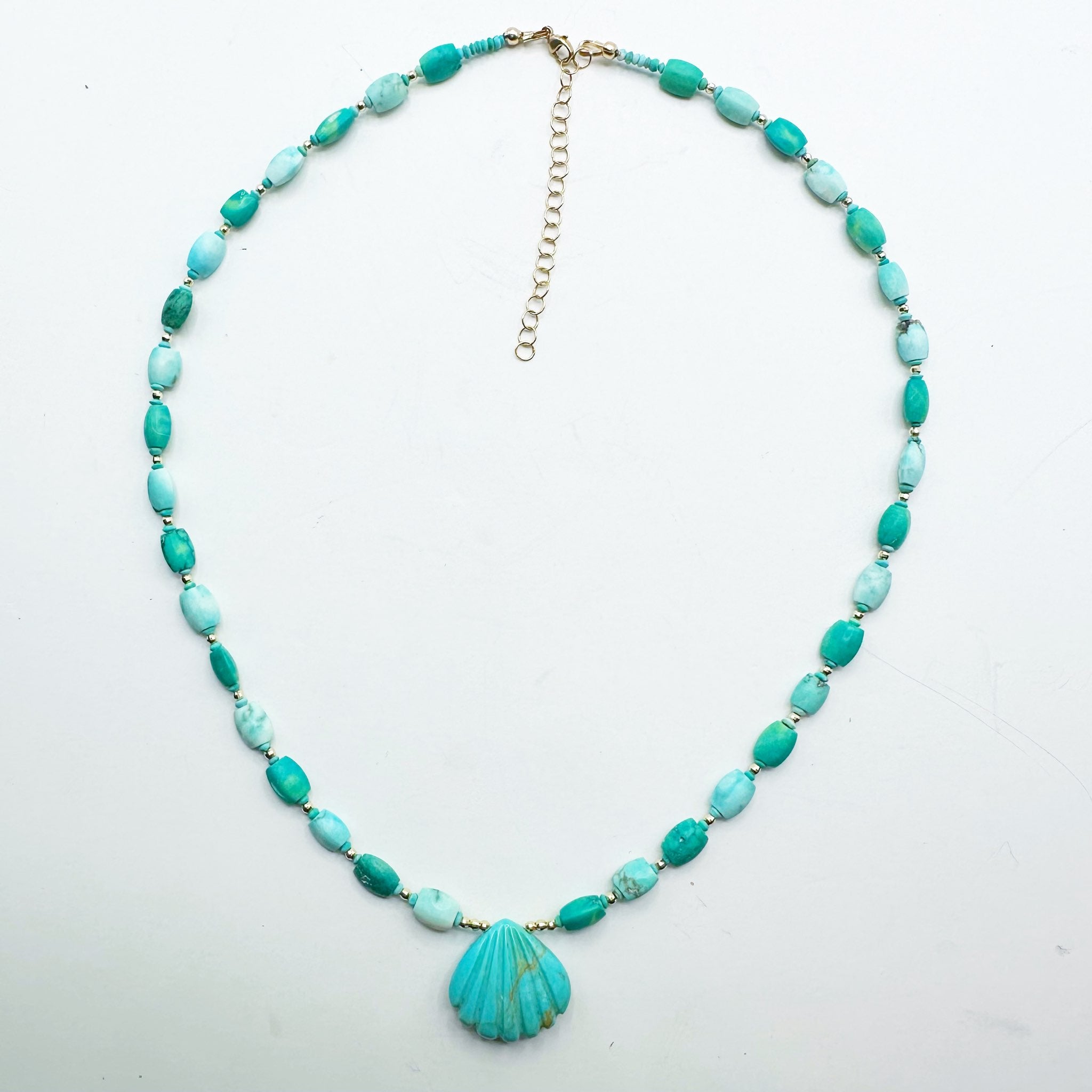 TURQUOISE NECKLACE WITH CARVED TURQUOISE SHELL