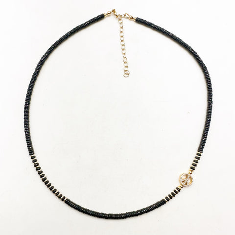 BLACK SPINEL AND DIAMOND PEACE NECKLACE