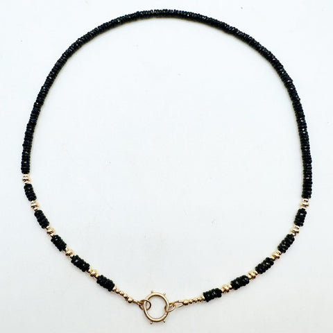 BLACK SPINEL AND 14K GOLD NECKLACE WITH CHARM HOLDER