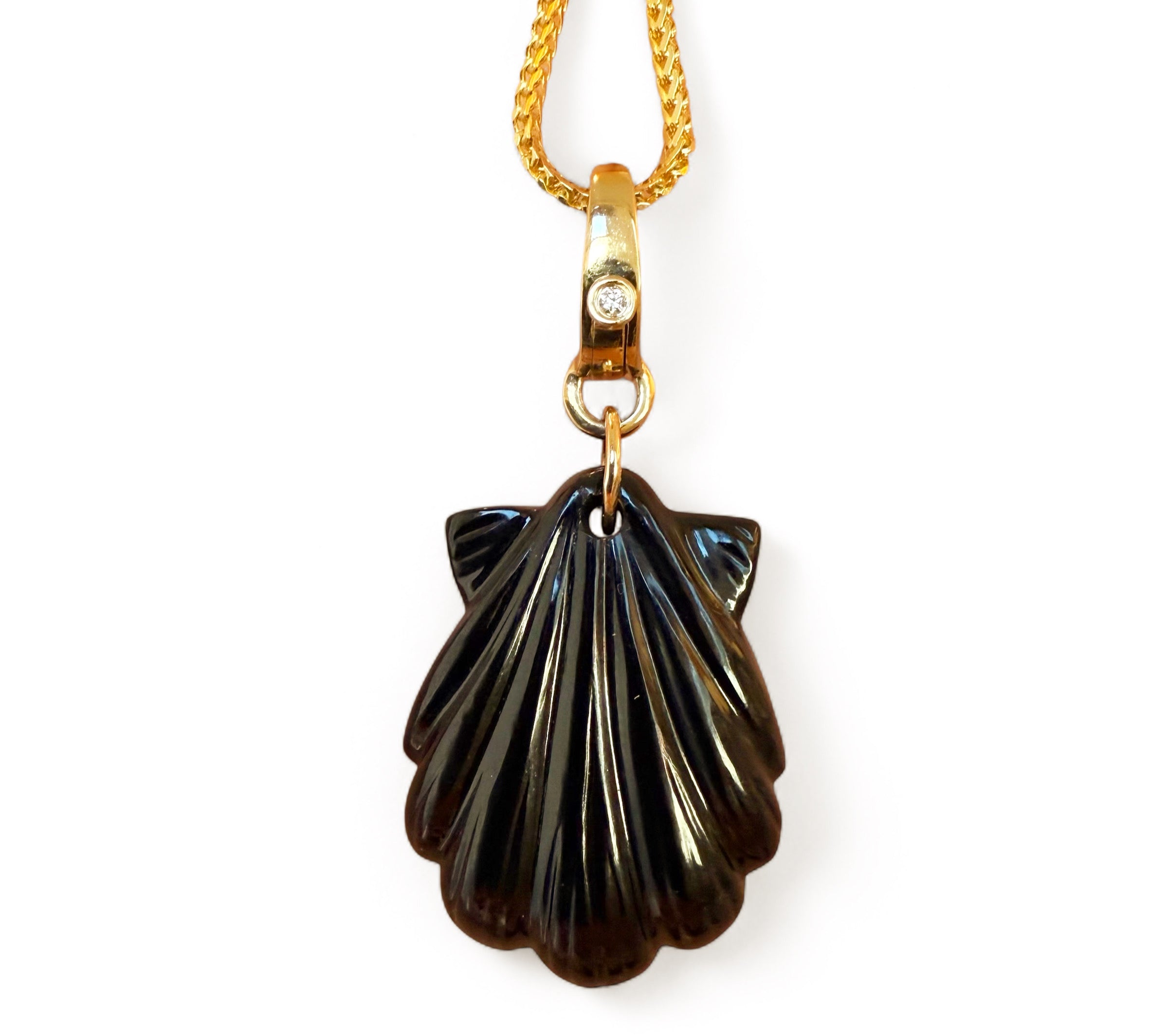 BLACK CARVED GEMSTONE WITH 14K GOLD BAIL
