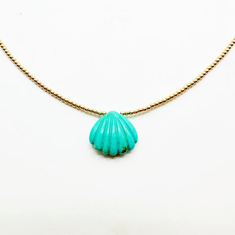 TURQUOISE SHELL NECKLACE WITH GOLD BEADS