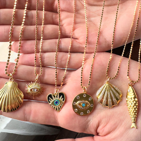 THE GOLD CHARMS & NECKLACES. SOLD INDIVIDUALLY.