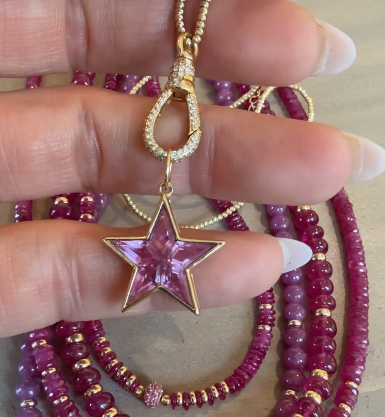 PINK TOPAZ STAR SET IN 14K GOLD