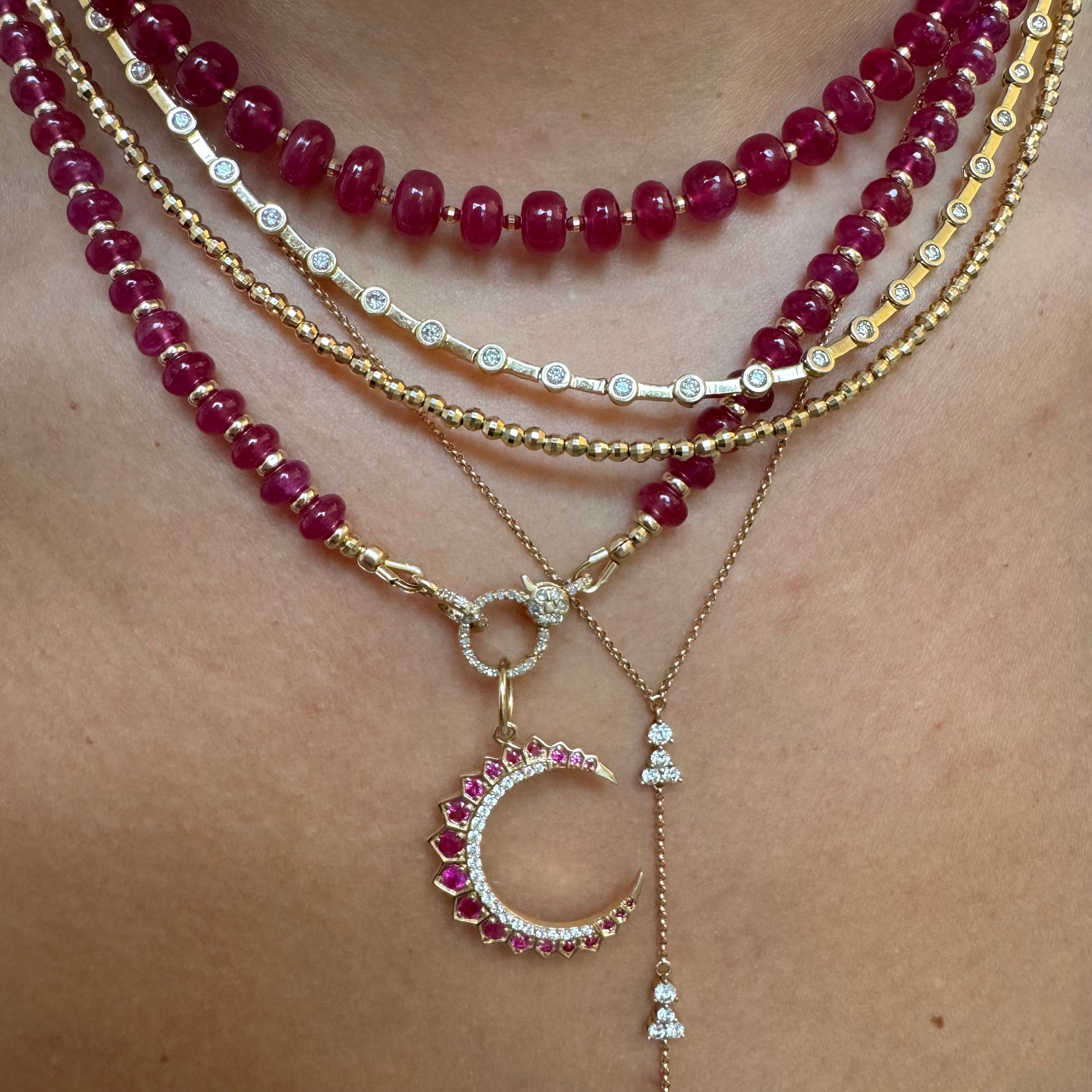 14K GOLD & RUBY NECKLACES. PLAIN STRAND WITH GOLD BEADS OR DIAMON CROSS STYLE