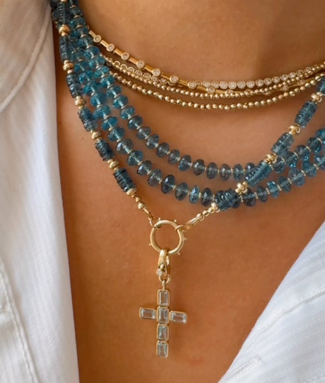 14K GOLD BLUE TOPAZ CROSS