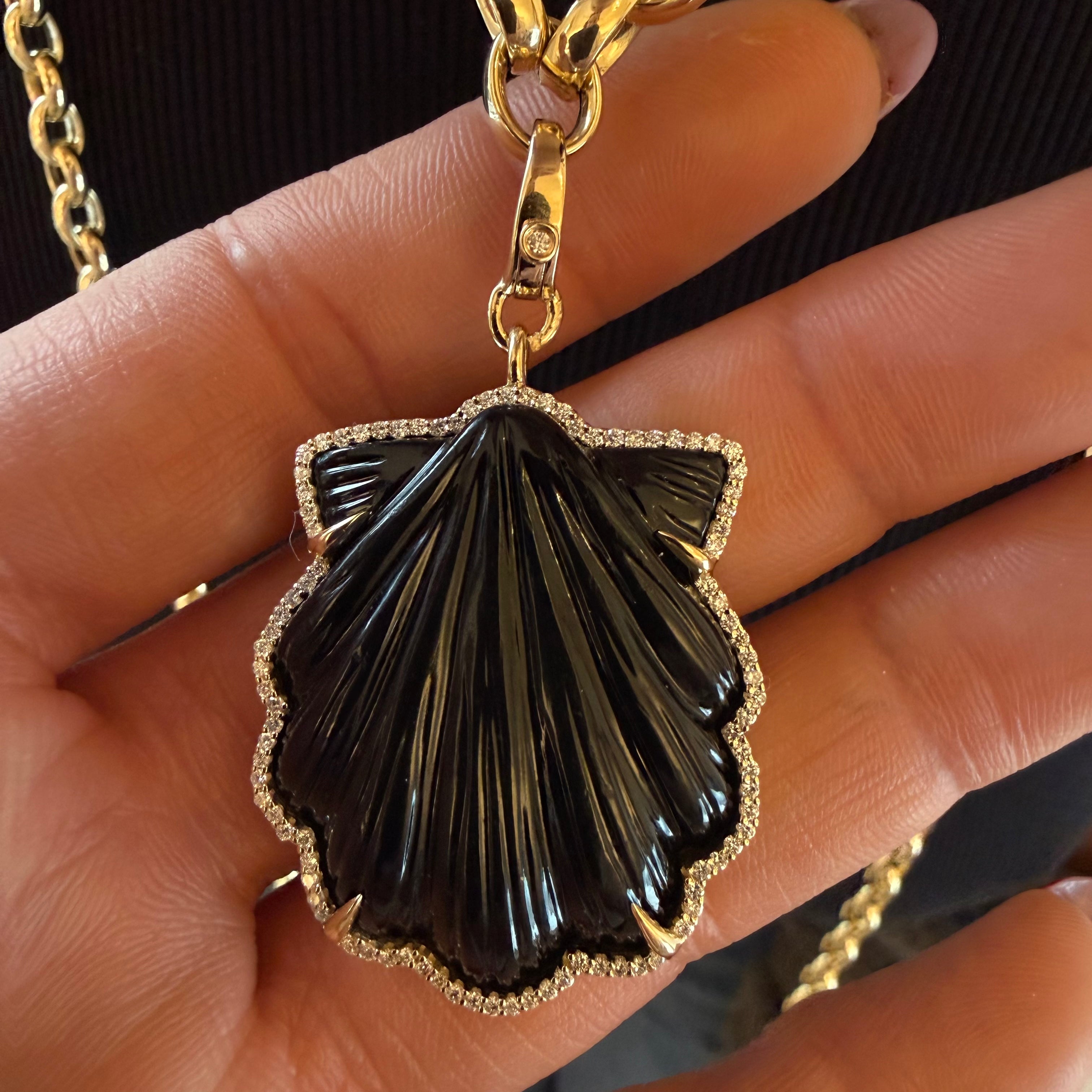 CARVED BLACK ONYX GEMSTONE SHELL AMULET SET IN 14K GOLD WHITE DIAMONDS