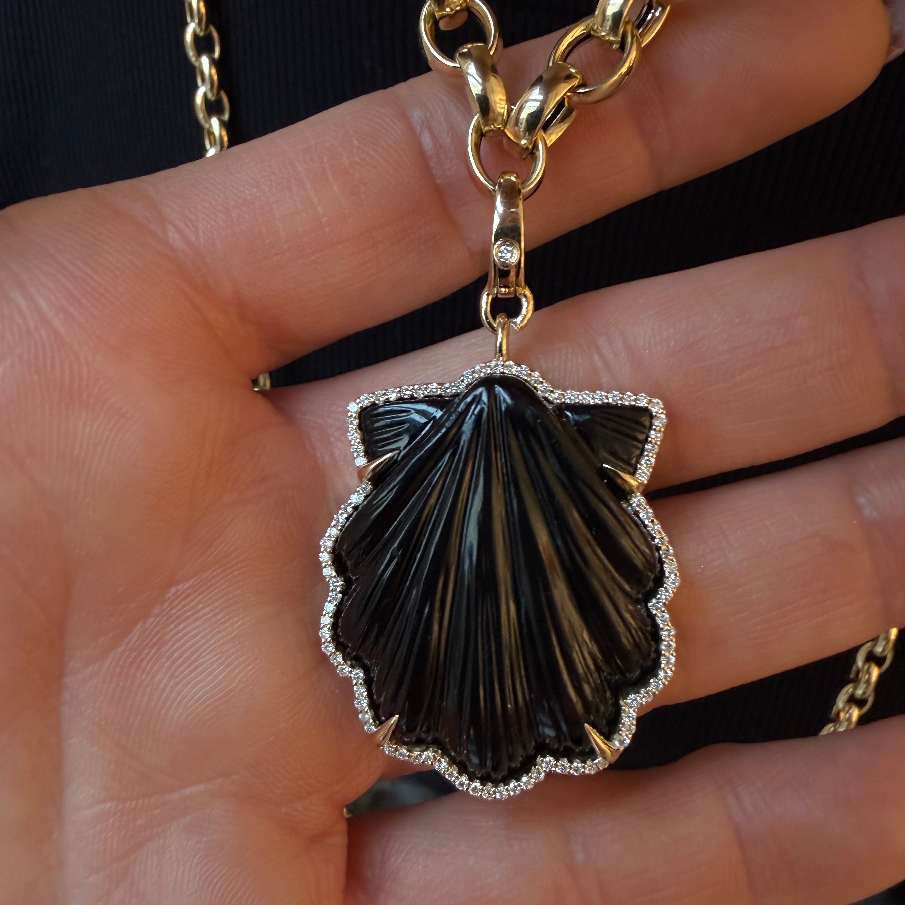 CARVED BLACK ONYX GEMSTONE SHELL AMULET SET IN 14K GOLD WHITE DIAMONDS