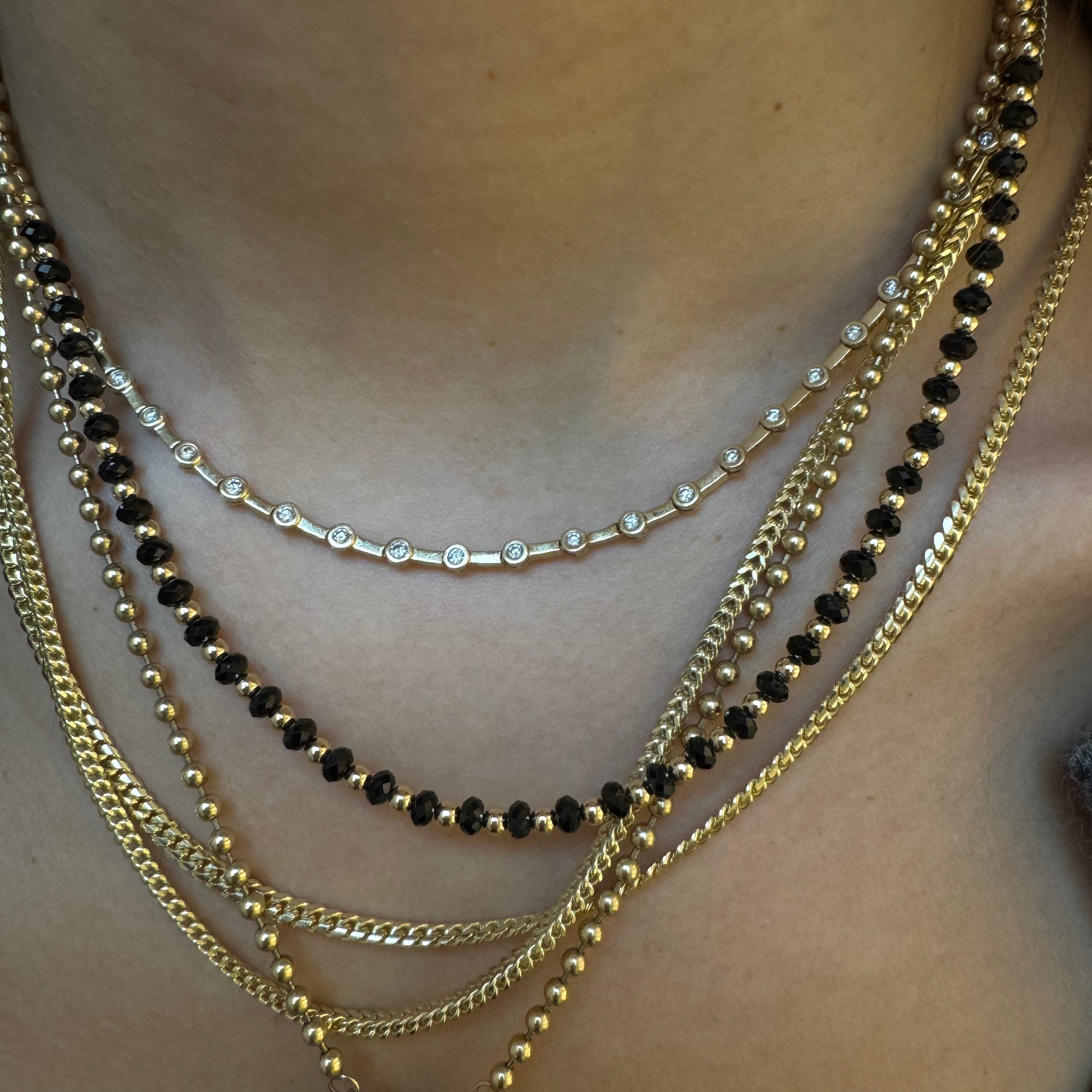 BLACK SPINEL AND GOLD BEADED NECKLACE