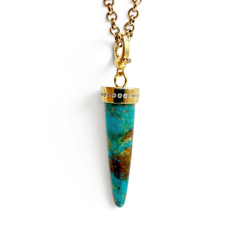 TURQUOISE BULLET SET IN SOLID 14K