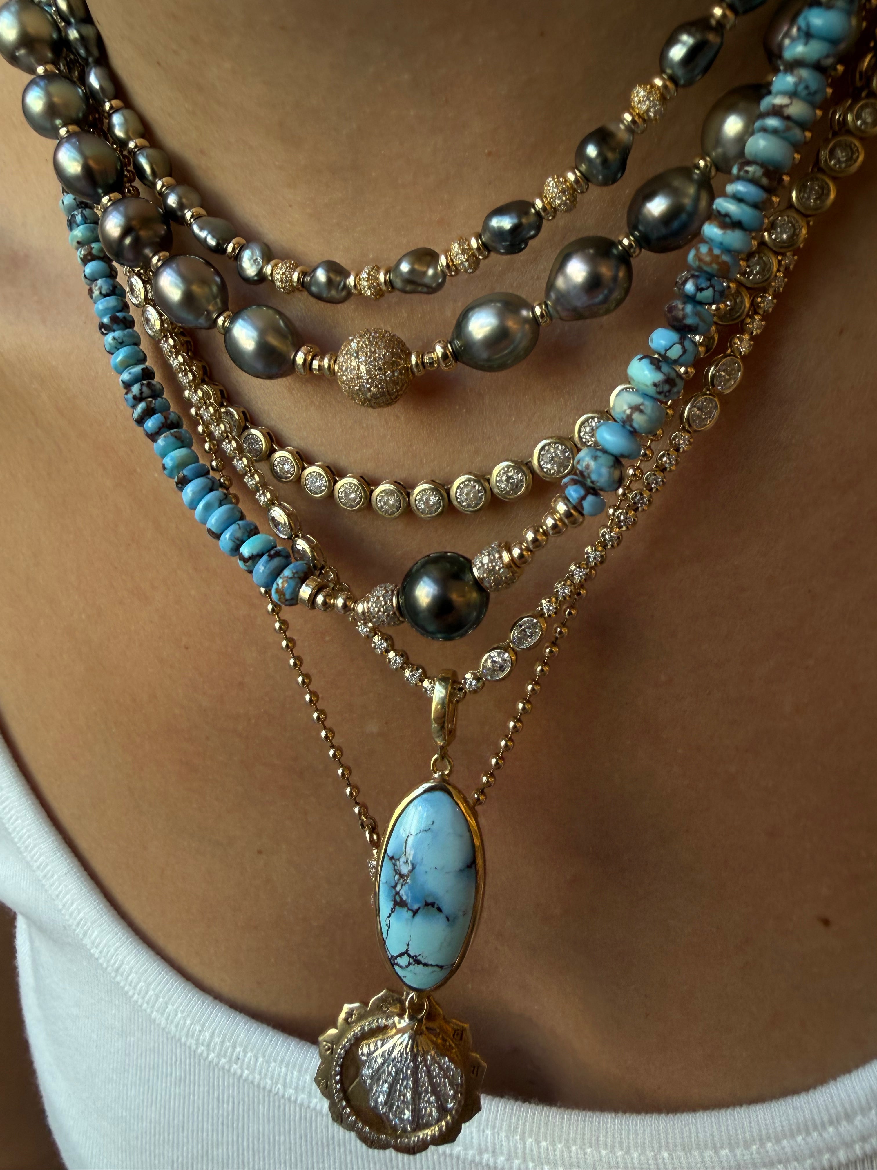 GOLDEN HILL PENDANT SET IN SOLID GOLD