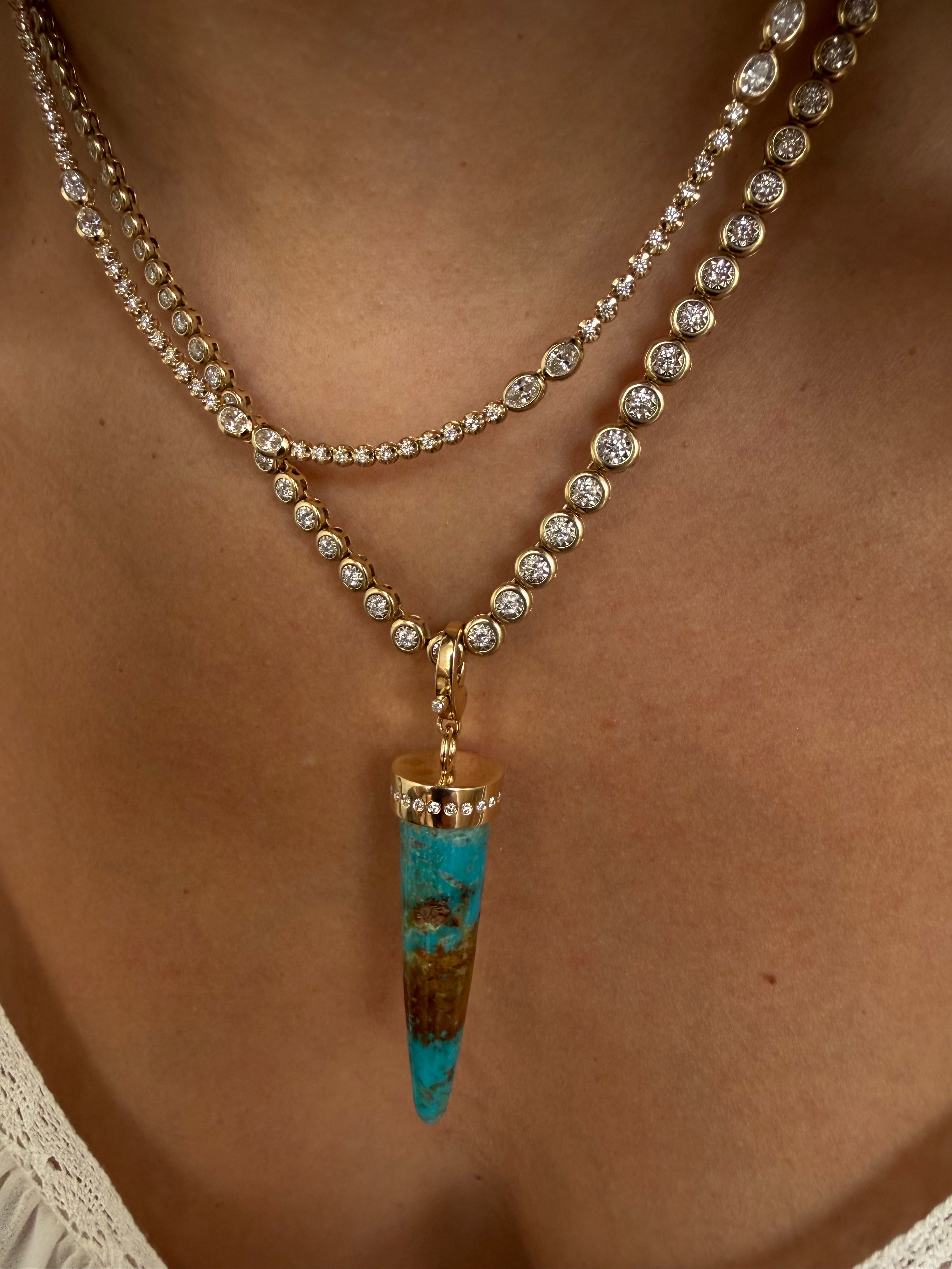TURQUOISE BULLET SET IN SOLID 14K