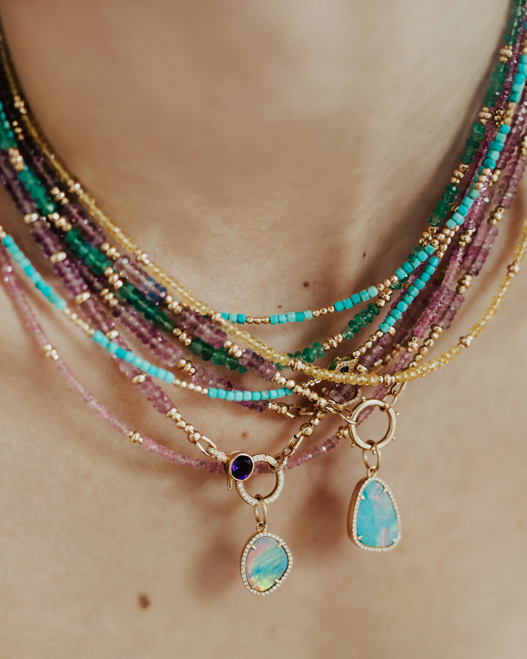 OPAL AMULETS WITH DIAMONDS SET IN 14K