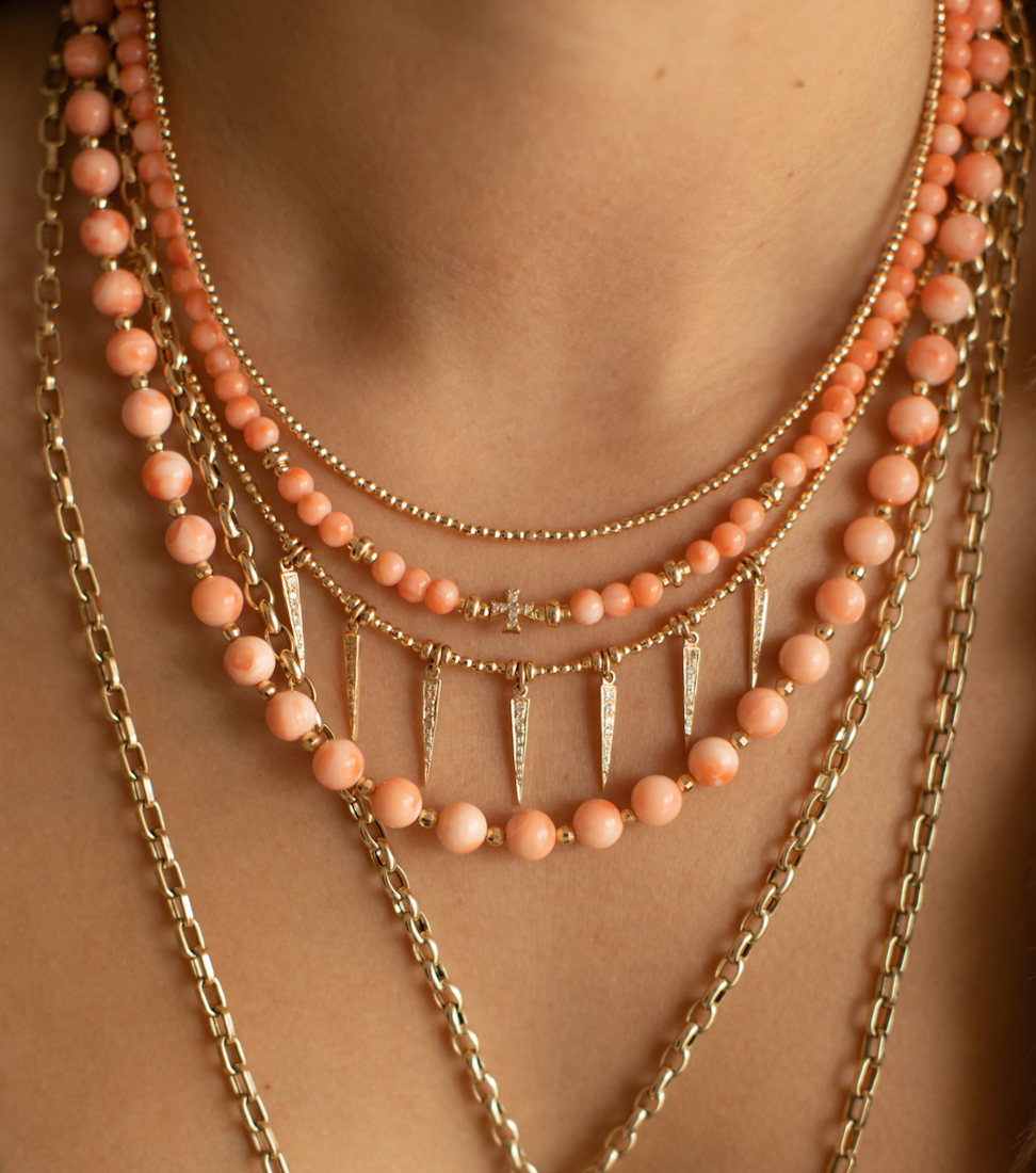 CORAL BEADED CHARM NECKLACES