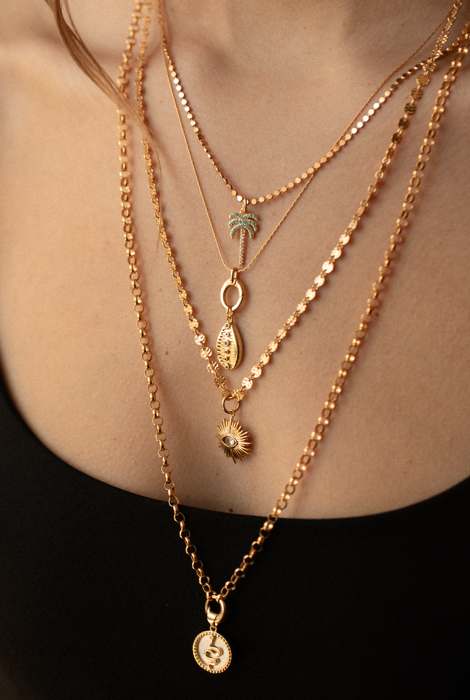 THE GOLD CHARMED COLLECTION. SOLD INDIVIDUALLY.