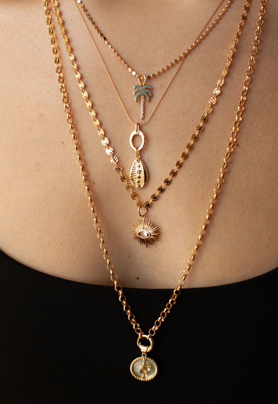 THE GOLD CHARMED COLLECTION. SOLD INDIVIDUALLY.