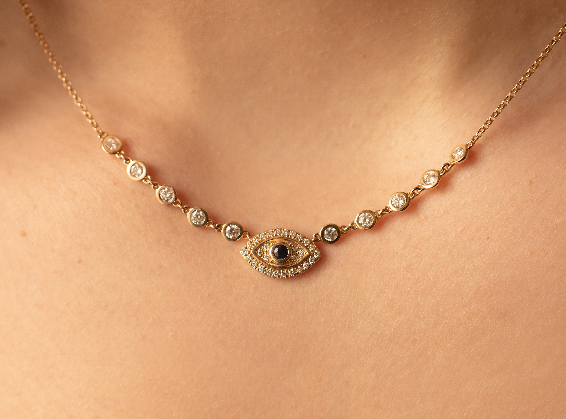 14K GOLD AND DIAMOND EVIL EYE NECKLACE