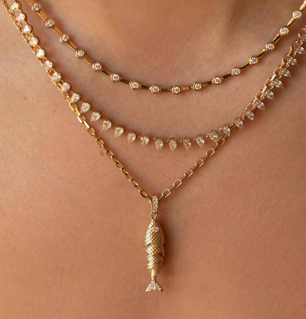 14K GOLD AND DIAMOND FISH CHARM
