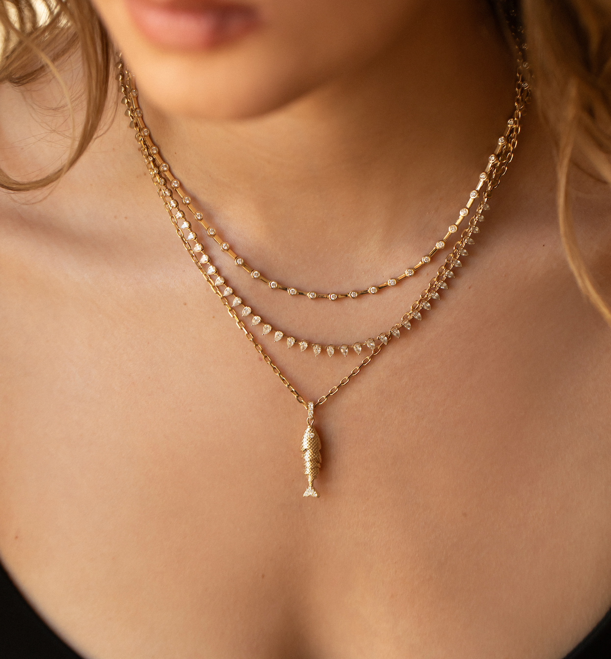 14K GOLD AND DIAMOND FISH CHARM