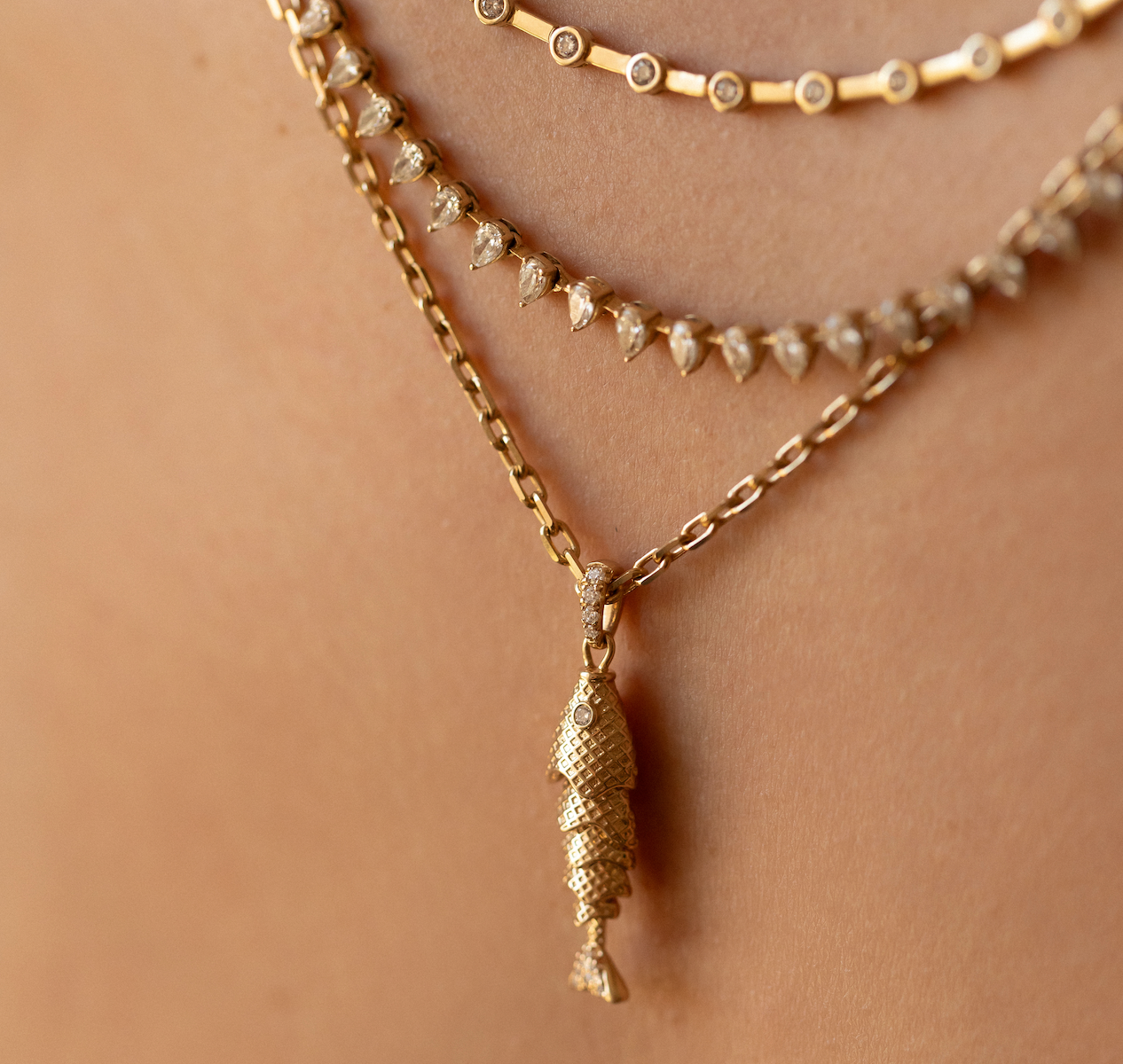 14K GOLD AND DIAMOND FISH CHARM