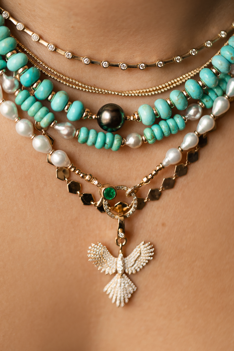 WHITE AKOYA PEARL NECKLACE WITH 14K DIAMOND AND EMERALD FRONT FACING CLASP