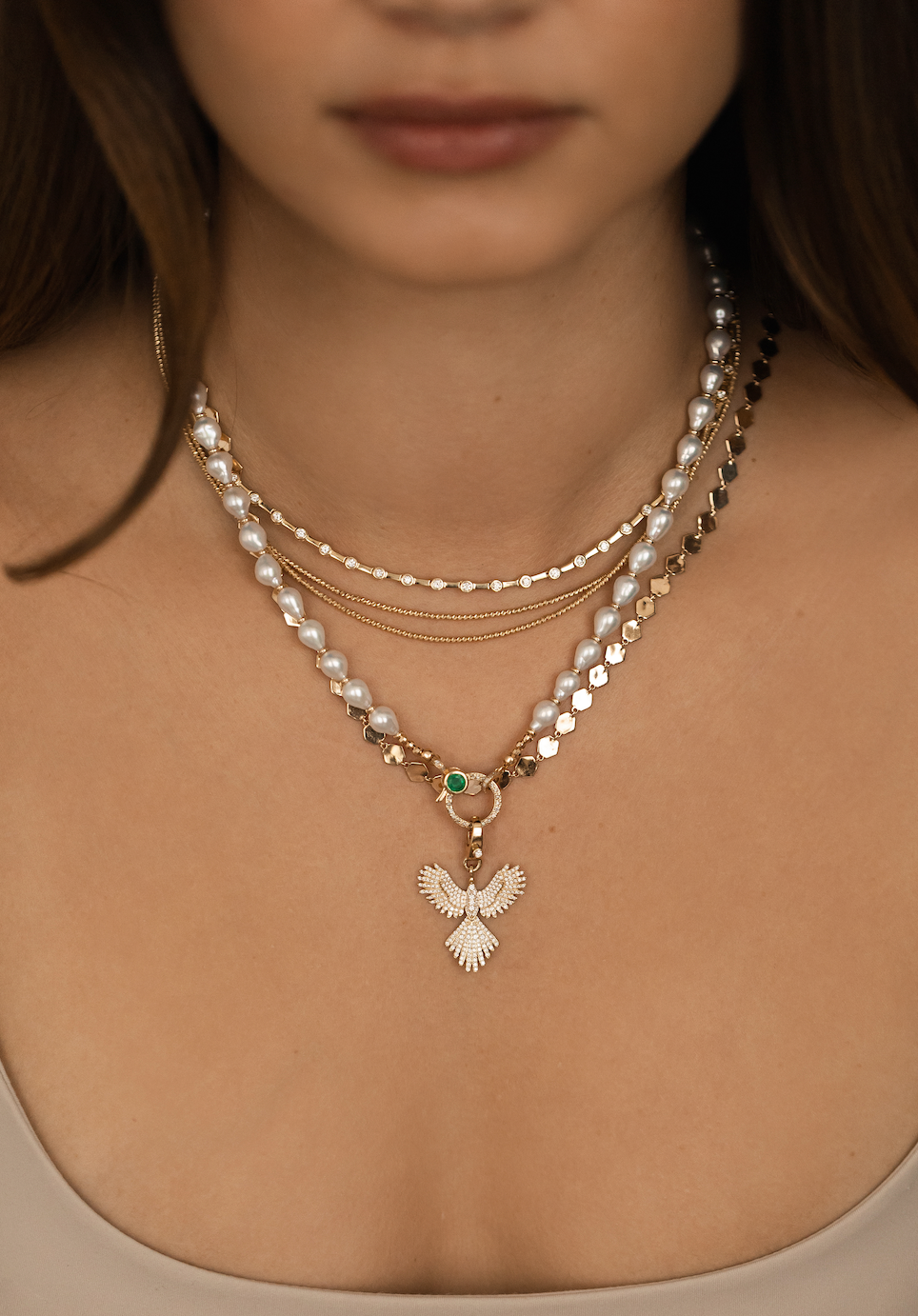 WHITE AKOYA PEARL NECKLACE WITH 14K DIAMOND AND EMERALD FRONT FACING CLASP