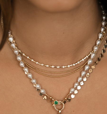 WHITE AKOYA PEARL NECKLACE WITH 14K DIAMOND AND EMERALD FRONT FACING CLASP