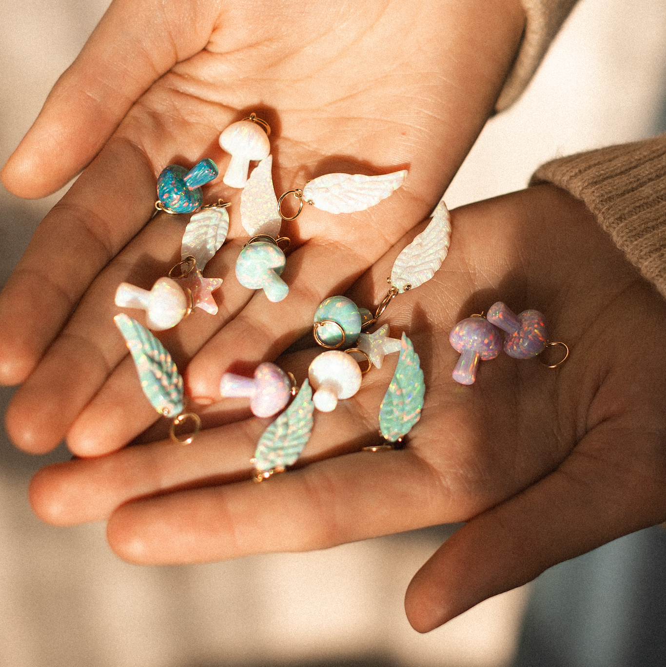 OPAL ANGEL WING CHARM