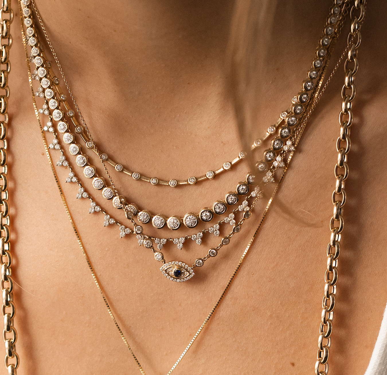 14K GOLD AND DIAMOND EVIL EYE NECKLACE