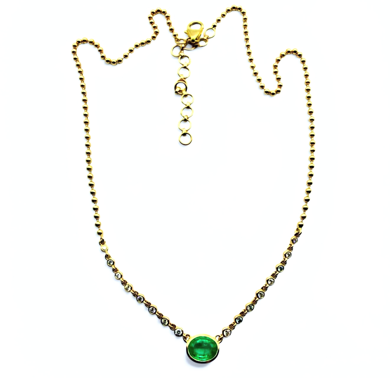 14K GOLD EMERALD AND DIAMOND HALO NECKLACE