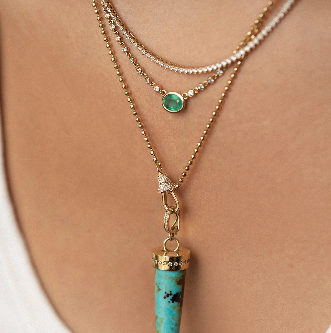 14K GOLD EMERALD AND DIAMOND HALO NECKLACE
