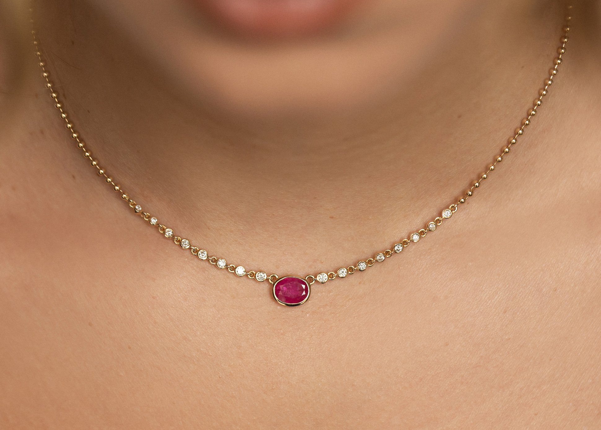 14K GOLD RUBY AND DIAMOND BEAD HALO NECKLACE
