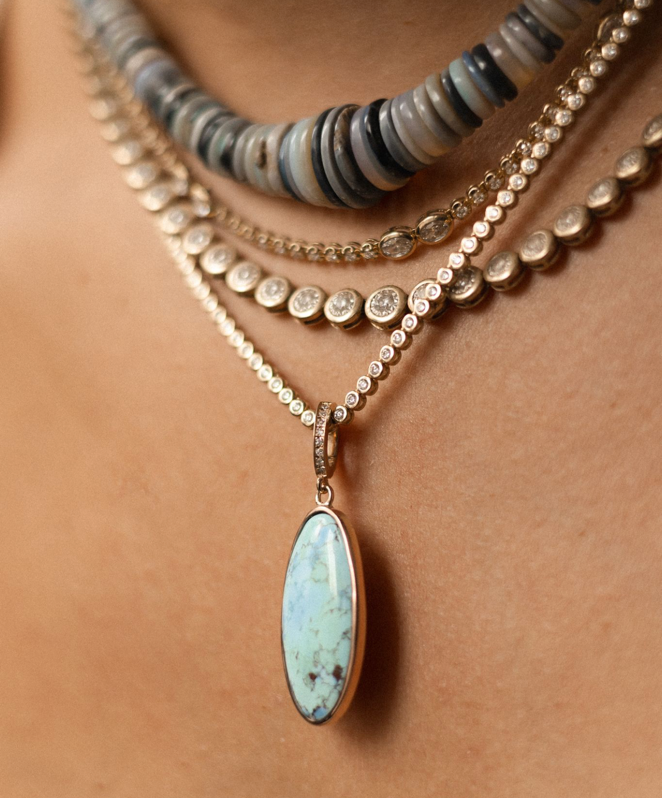 TURQUOISE AMULET WITH DIAMOND BAIL