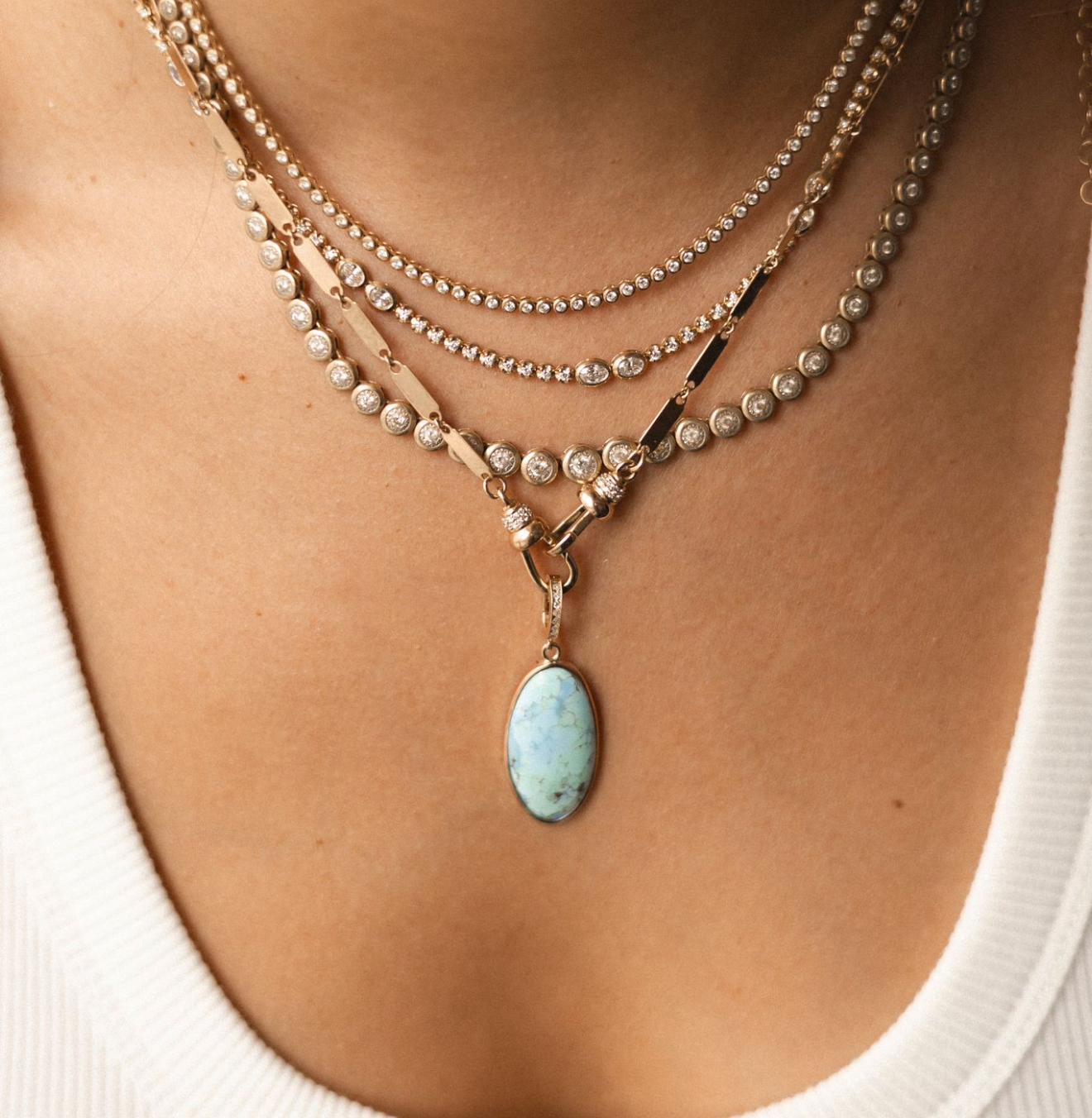 TURQUOISE AMULET WITH DIAMOND BAIL