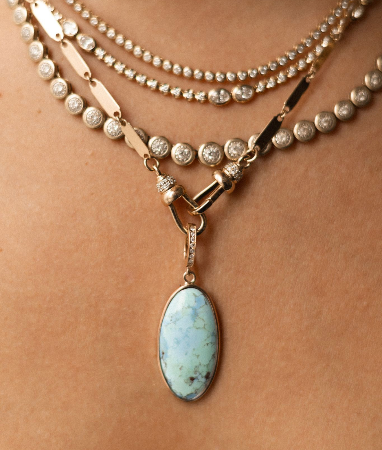 TURQUOISE AMULET WITH DIAMOND BAIL
