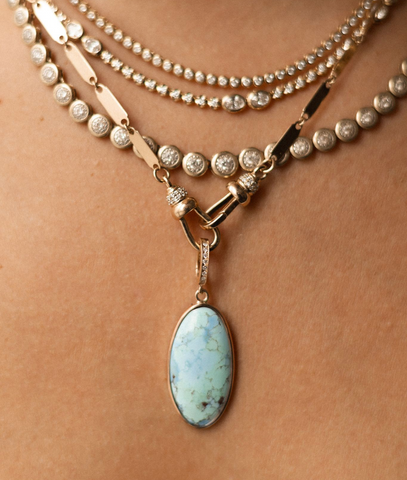 TURQUOISE AMULET WITH DIAMOND BAIL