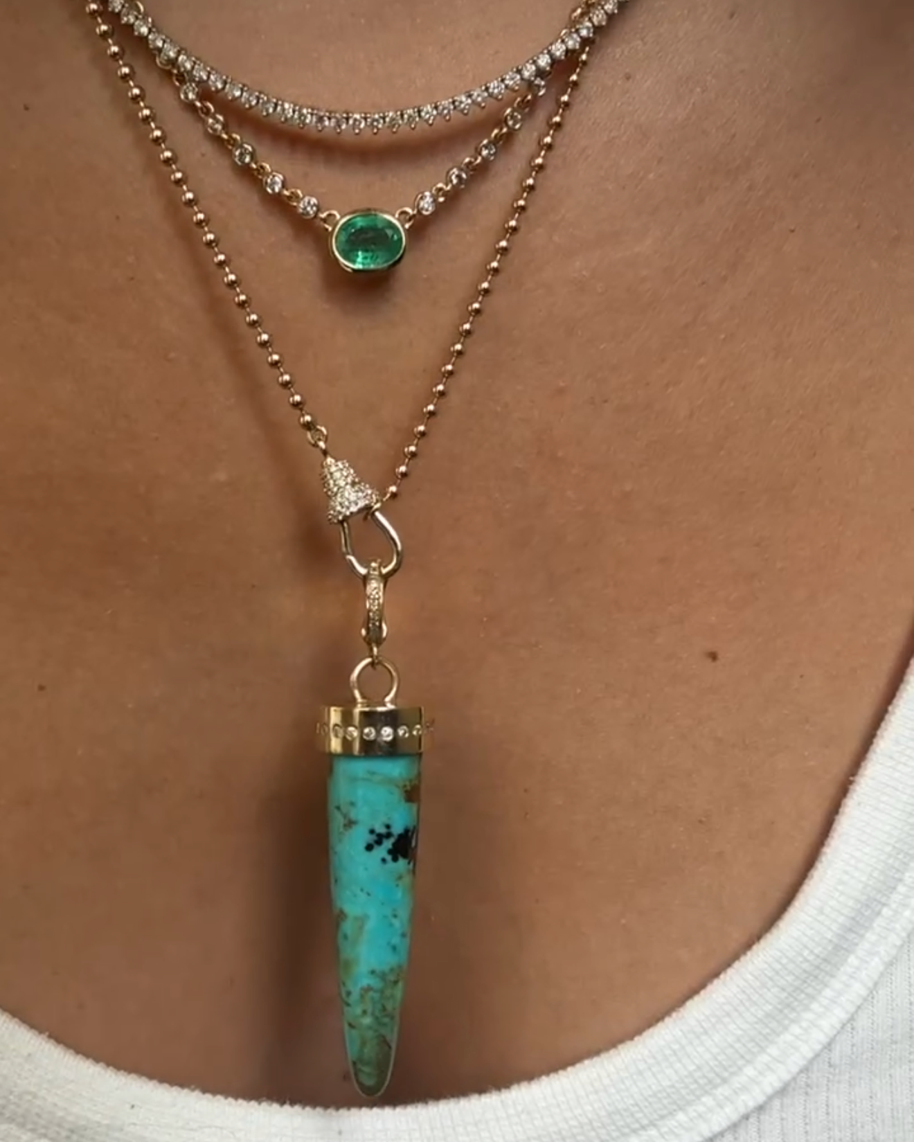 14K GOLD EMERALD AND DIAMOND HALO NECKLACE