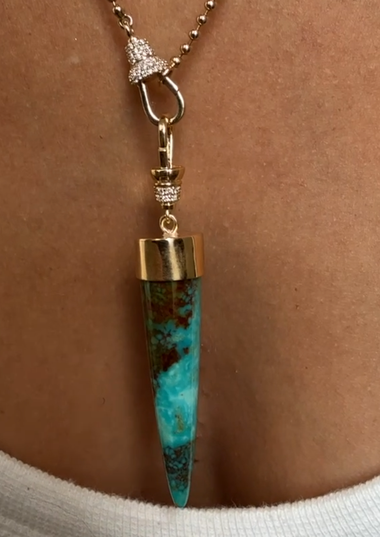 TURQUOISE BULLET CHARM SET IN SOLID GOLD