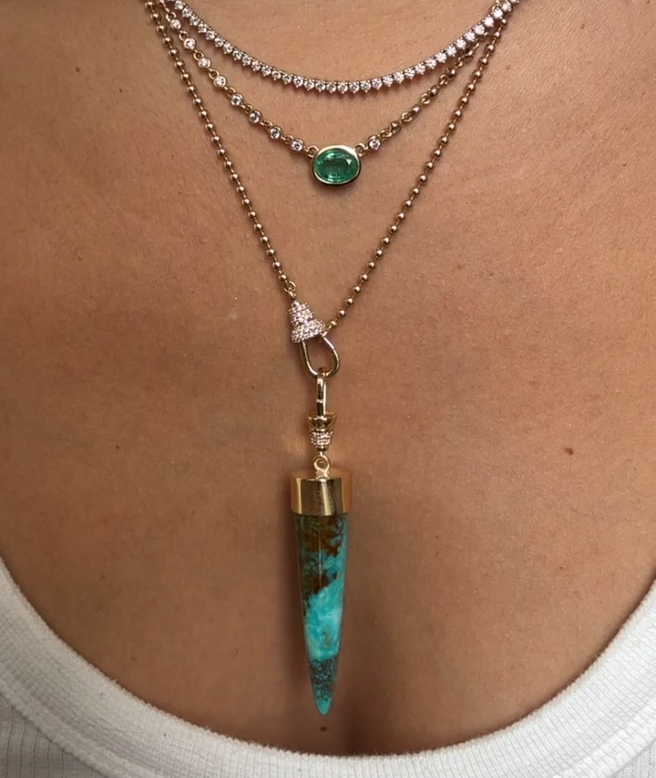 TURQUOISE BULLET CHARM SET IN SOLID GOLD