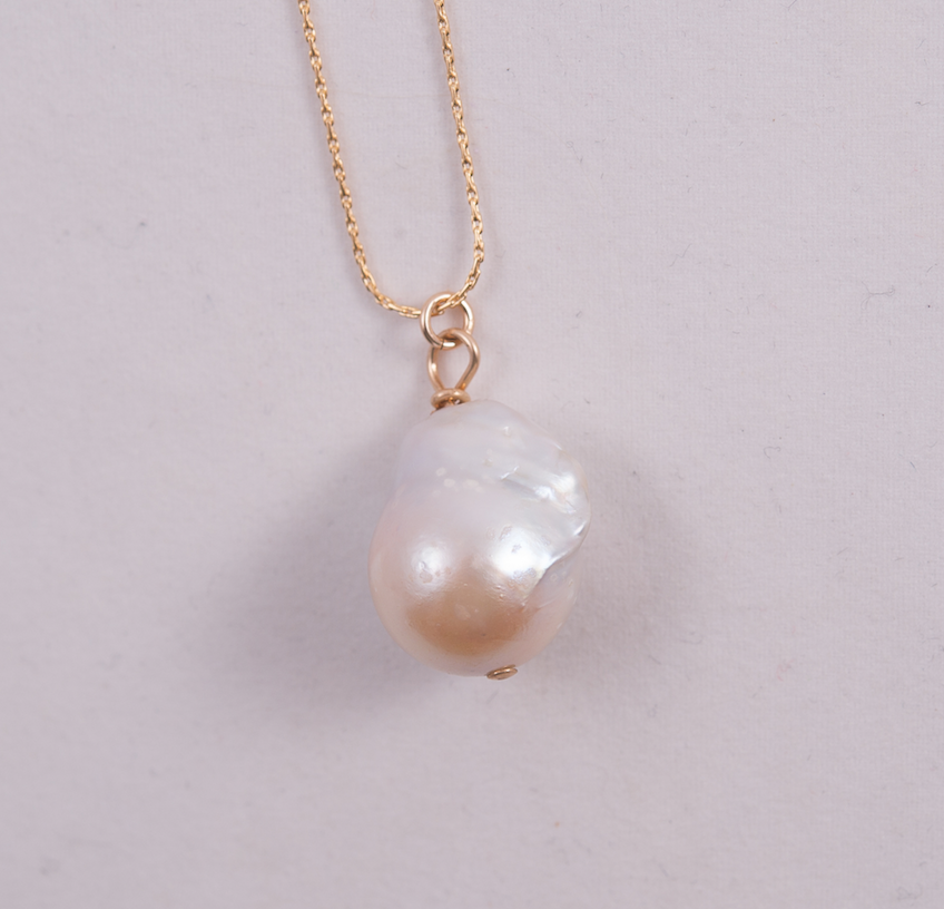 MOTHER OF PEARL AMULET